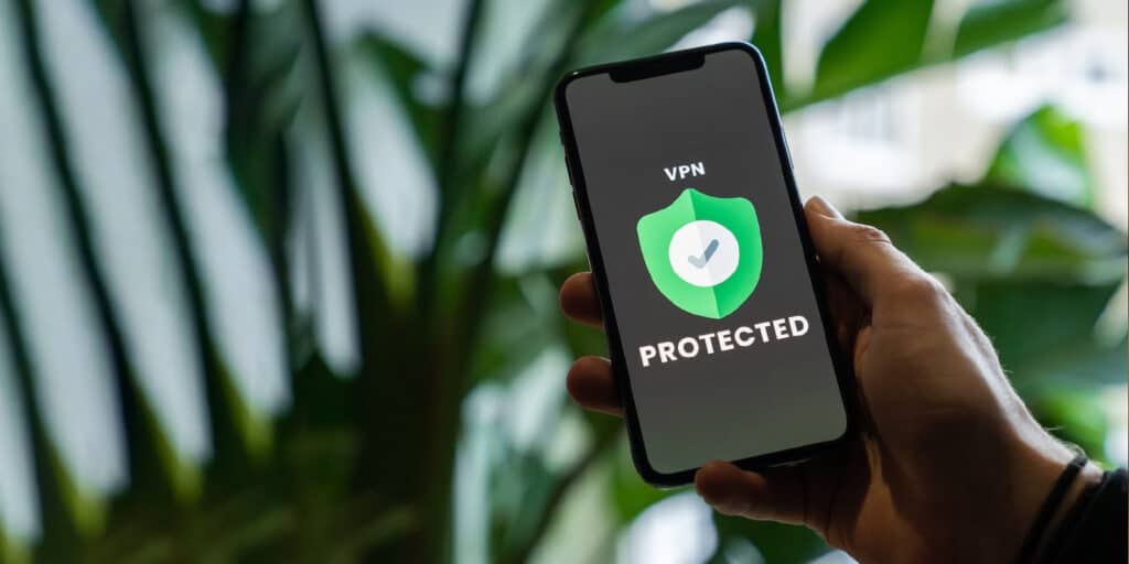 Phone showing a protected VPN on the screen to guard against network security threats